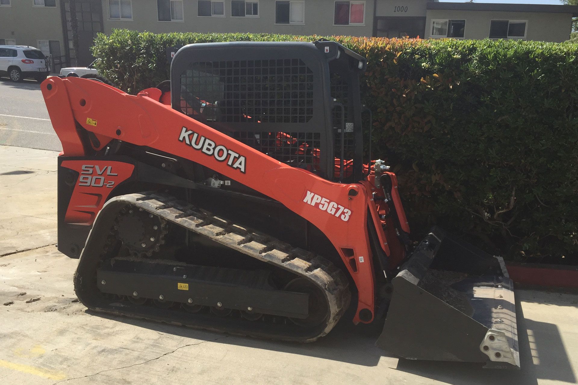 Kubota SVL90-2 compact track loader on site at the start of a grading job